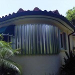 Curved Storm Panels and Accordion Shutters in Miami